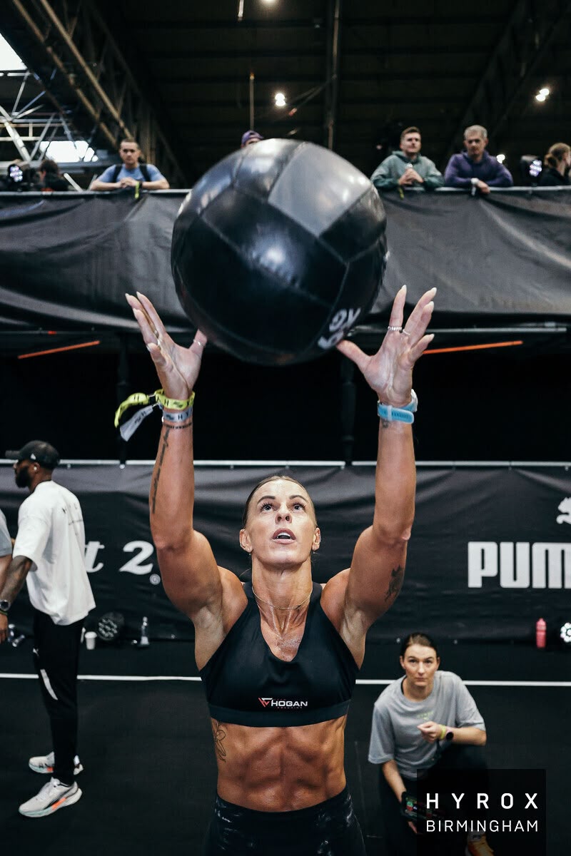 Team Hogan athlete on wall balls at HYROX Birmingham