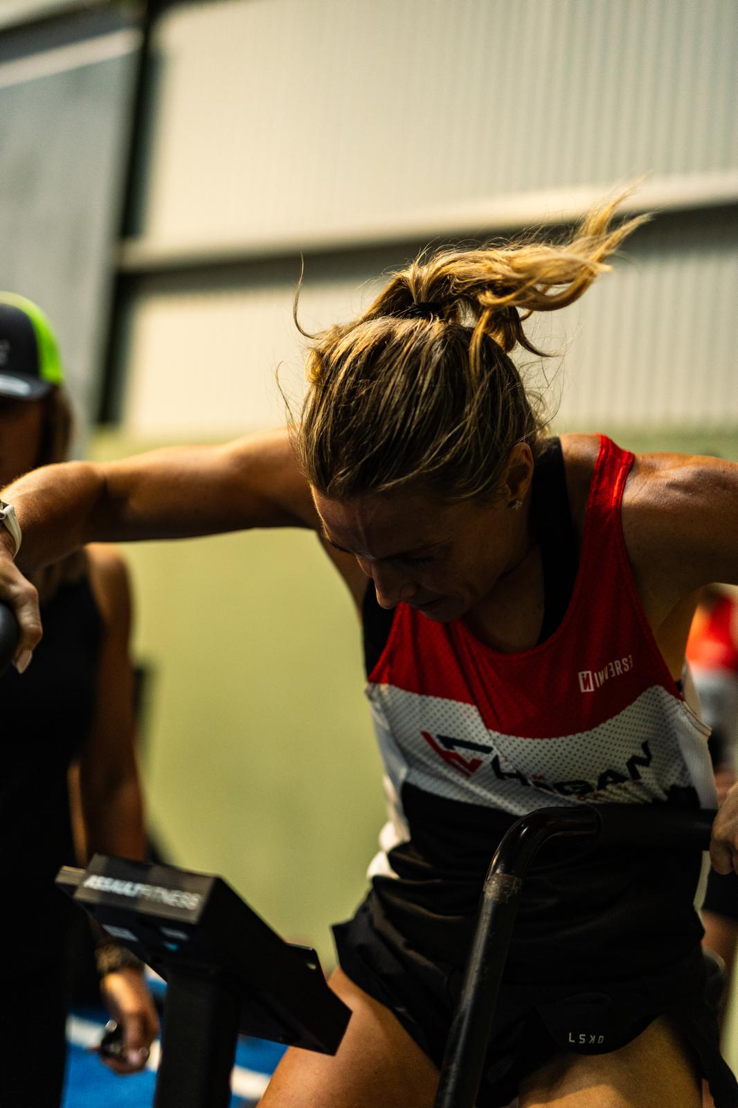 Team Hogan athlete on the assault bike